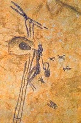 Pintura neolítica. Mujer en un árbol que saca la miel del panal