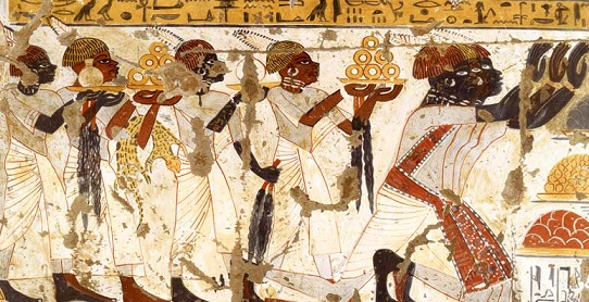 Los nubios pagando al faraón egipcio con comida y objetos valiosos